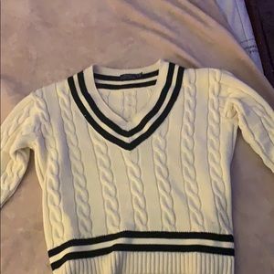 a polo sweater